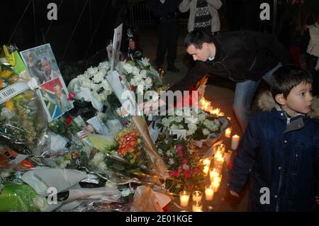 French people pay tribute to Nelson Mandela in front of South African embassy in Paris, France on December 6, 2013. Photo by Alain Apaydin/ABACAPRESS.COM Stock Photo