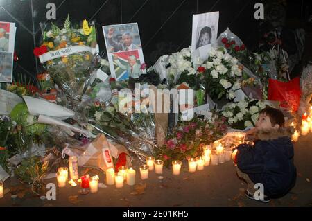 French people pay tribute to Nelson Mandela in front of South African embassy in Paris, France on December 6, 2013. Photo by Alain Apaydin/ABACAPRESS.COM Stock Photo