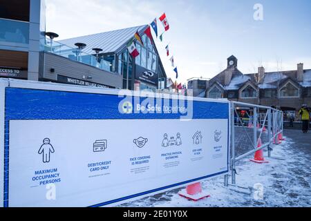 WHISTLER, BC, CANADA - DEC 27, 2020: Covid 19 health advisory signs in Whistler Village. Stock Photo