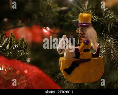 Toy soldier ornament on a Christmas Tree Stock Photo