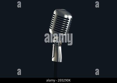 Retro style vintage microphone isolated on black studio background Stock Photo