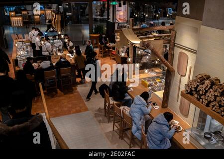 Chinese customers in the Cafe&Meal area of the MUJI flagship store, newly opened in Tianjin. Stock Photo