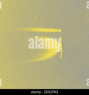 Inversion of a burnt match against the background of a paper texture with an unusual shadow, abstraction, the letter I. High quality photo Stock Photo