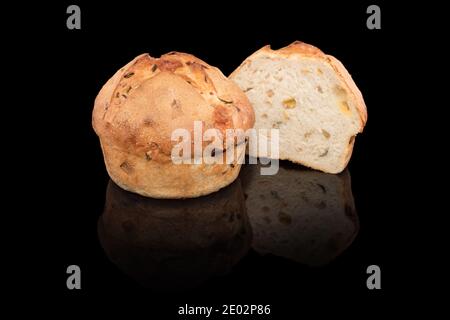 Freshly baked homemade bread isolated on black. Cut in half cheese and onion bread. Healthy eating and traditional bakery, baking bread concept Stock Photo
