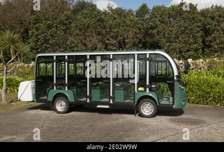 Green Epower Electric Bus Parked Outside the Abbey Gardens on the Island of Tresco in the Isles of Scilly Stock Photo