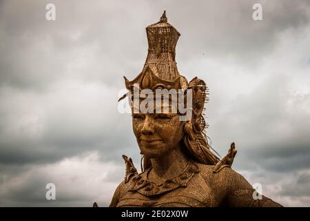 The statue of Dewi Sri, goddess of rice and fertility at Jatiluwih Rice Terrace in Bali Stock Photo