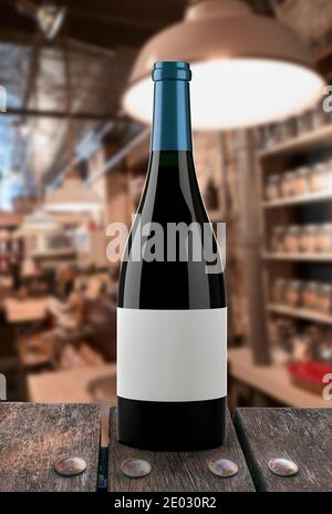 Bottle of red wine with a restaurant background Stock Photo
