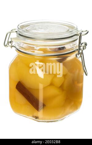 apple compote in traditional jar with metal closure isolated on white background Stock Photo