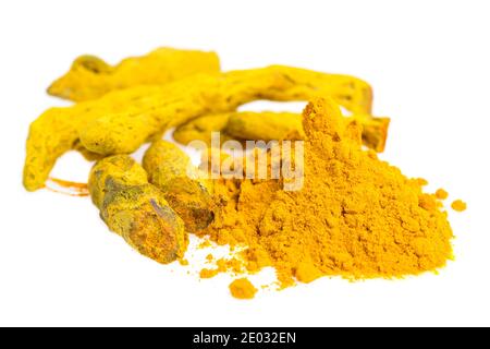 Turmeric - A whole root and powder isolated on white background Stock Photo