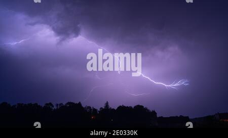 Before the Storm - Thunderbolt at Night Stock Photo - Alamy