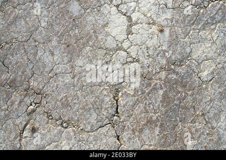 Texture of a concrete wall in gray. Concept of grey background created from picture of stone surface . Stock Photo