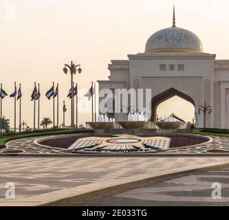 Abu Dhabi, UAE - March 31. 2019. The Arch main entrance to Presidential Palace On the Sunset Stock Photo