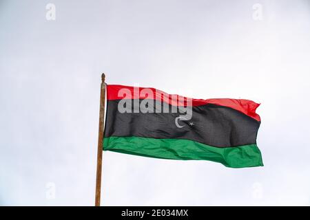 Flag of the state of Libya The flag of Libya was originally introduced in 1951, following the creation of the Kingdom of Libya. Stock Photo