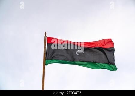 Flag of the state of Libya The flag of Libya was originally introduced in 1951, following the creation of the Kingdom of Libya. Stock Photo