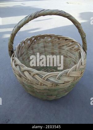 Closeup of handmade bamboo picnic basket, empty wicker basket Stock Photo