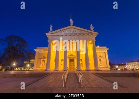 Cathedral with Bell Tower and Gediminas statue Square in Vilnius at night, Lithuania Stock Photo