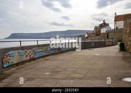 Robin Hood's Bay, an old fishing village below the cliffs, a haven which consists of a maze of tiny streets, and a tradition of smuggling. Stock Photo