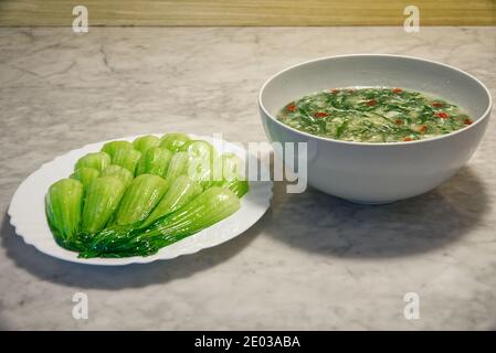 Stir-fried organic bok choy on the table, vegetable soup with wolfberries, vegetarian, healthy eating Stock Photo