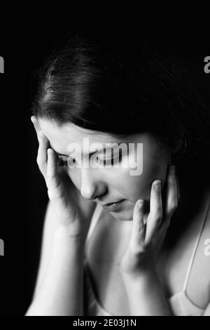 young woman in sad attitude II, spain Stock Photo