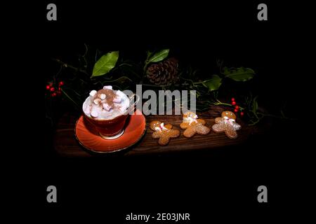 Fresh baked  Gingerbread mann on dark back ground  christmas Stock Photo