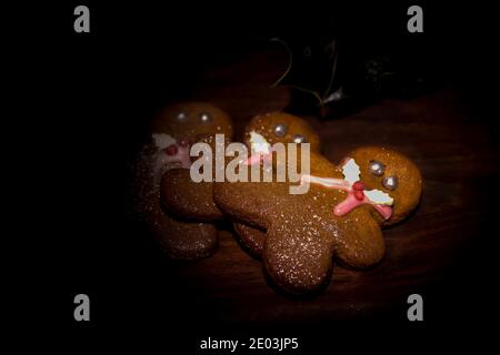 Fresh baked  Gingerbread mann on dark back ground  christmas Stock Photo