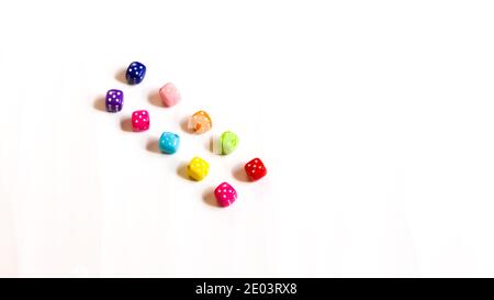 Colored dice on a white background. Stock Photo
