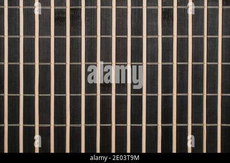 Black and yellow bamboo mat background 3:2 ratio Stock Photo