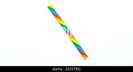 Candy stick for kids on white isolated background, macro close up. High quality photo Stock Photo