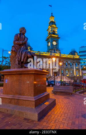 Sunset view of Dunedin town hall in New Zealand Stock Photo