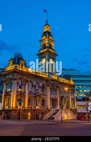 Sunset view of Dunedin town hall in New Zealand Stock Photo