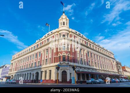 Sunset view of Otago Daily Timesh building in the center of Dunedin, New Zealand Stock Photo