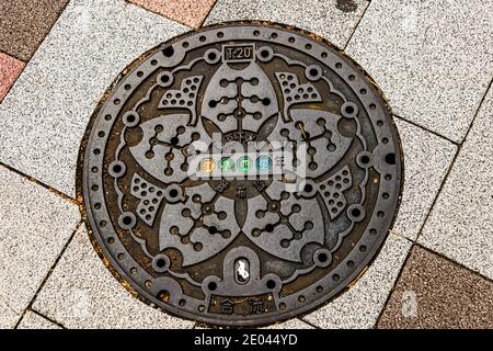 Manhole cover in Tokyo, Chuo, Japan Stock Photo