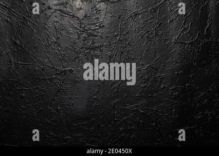 Black or dark gray crumpled texture background Stock Photo