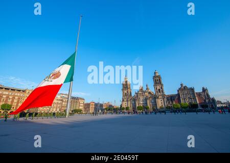 Raising Flag Guard of Honor stand on Zocalo in front of Metropolitan Cathedral at Historic center of Mexico City CDMX, Mexico.