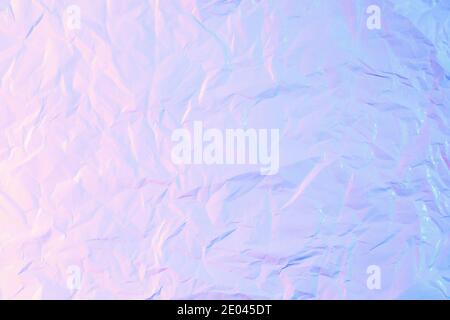 White crumpled paper texture background in neon light Stock Photo