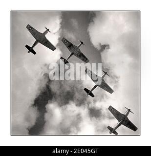Archive WW2 American Airforce Four P-51 Mustangs flying in formation. Ramitelli, Italy, March 1945  Frissell, Toni, photographer 1945 March  United States Army Air Forces Fighter Group, 332nd--1940-1950 World War, 1939-1945--Air operations--American--Italy -  Airplanes--American--Italy--1940-1950- World War II Stock Photo