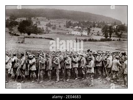 WW1 GERMAN PRISONERS WORK SPADES FIELD FRANCE Propaganda French Photo of German prisoners in France returning from work Photograph shows German prisoners with spades in a field in France during World War I.[1917] World War, 1914-1918 Glass negatives.. Published in: The Sunday Oregonian, May 27, 1917. Stock Photo