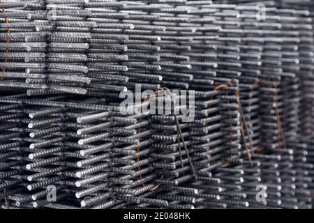 Steel rods for construction. Metal for concrete base. Close up of iron rods used for construction Stock Photo