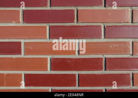 Brick wall background. Fresh brickwork. The work of a bricklayer. Painted brick wall Stock Photo