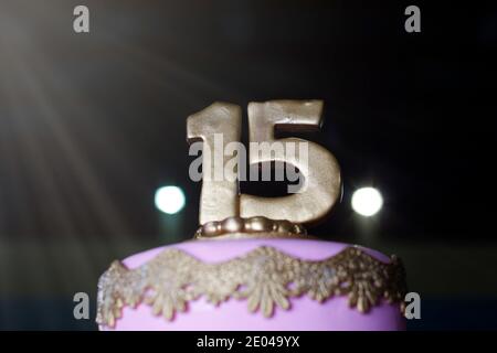 Pink party cake, 15th birthday, with golden number fifteen, pink cake, 15 year old birthday cake Stock Photo