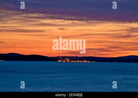 Zadar waterfront and Ugljan island sunset view, Dalmatia region of Croatia Stock Photo