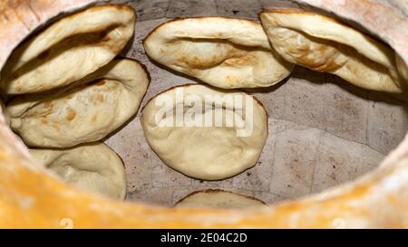 Pita bread in oven Stock Photo - Alamy