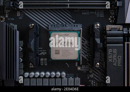 Sarajevo, Bosnia and Herzegovina - December 29, 2020: AMD Ryzen 9 5900x processor in AM4 Aourus x570 Pro motherboard socket Stock Photo