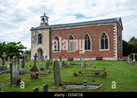 The parish church of St Andrew (not National Trust) in the grounds of the Wimpole Estate, Cambridgeshire, England. Stock Photo