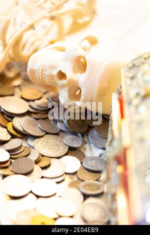 Skeleton of a greedy Pirate who found a treasure chest Stock Photo