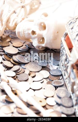 Skeleton of a greedy Pirate who found a treasure chest Stock Photo