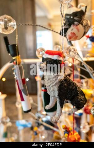 Christmas Ornaments on Modern Holiday Tree Stock Photo