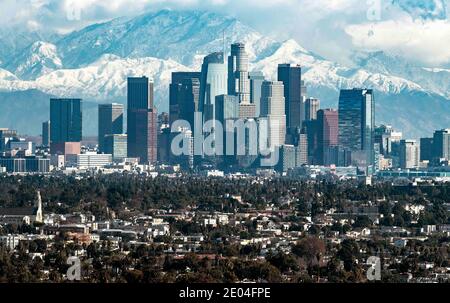 December 29, 2020, Los Angeles, California, USA - The Los Angeles skyline as seen from the Baldwin Hills Scenic Overlook on a day after rain fell on Los Angeles and snow fell on the San Gabriel Mountains north and east of downtown.(Credit Image: © Brian Cahn/ZUMA Wire) Stock Photo