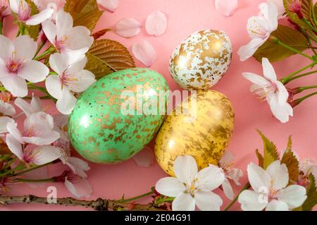 Christianity, spring religious holiday and Christian tradition concept theme with close up on a group of colorful Easter eggs dyed in pastel colors wi Stock Photo