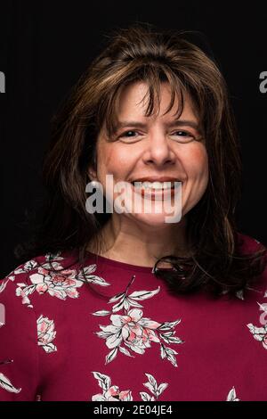 Brunette middle aged caucasian female headshot. Stock Photo